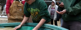 Deanna Fitzgerald, a senior member of Missouri S&T's 2014 world champion women's mucking team, pans for gold during the international Intercollegiate Mining Games last year at the Experimental Mine in Rolla. This year, the team is traveling a little further, to Kalgoorlie, Australia, to defend its crown.