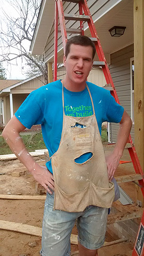 McGraw takes a break from painting a house in Hattiesburg, Mississippi, with Miner Challenge Alternative Spring Break 2015’s Mississippi team. The team is building houses this week for victims of Hurricane Katrina. 