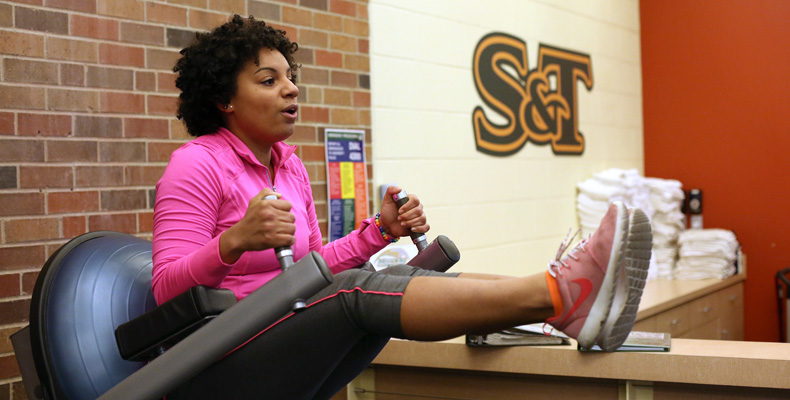 Kamaria Blaney exercises at the S&T Fitness Center on a recent morning.