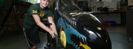 Lucas Parker poses with the Human Powered Vehicle Competition Team’s current vehicle, named “Leviathan,” which recently won the American Society of Mechanical Engineers 2015 Human Powered Vehicle Challenge East Coast Competition in Gainesville, Florida.