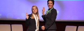 Jamielee Buenemann (left) is recognized by Anna Maria Chávez, CEO of the Girl Scouts of the USA, at the National Young Women of Distinction event in New York.
